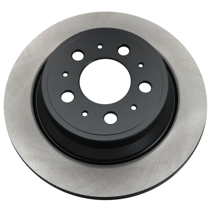 Close-up of the C26218 ProSeries OE+ Brake Rotor, featuring a metallic disc with a black center and multiple circular holes.