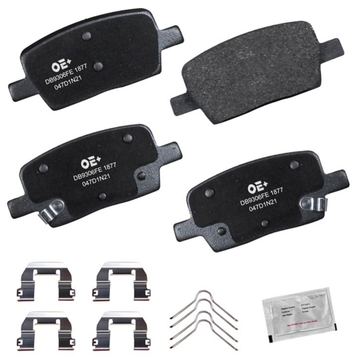 Top view of the MMS1877 ProSeries OE+ Brake Pads kit, which includes four brake pads, four brackets, two springs, and a sachet of brake lubricant.