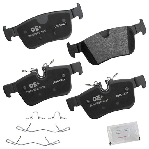 A set of four MMS1938 ProSeries OE+ Brake Pads, complete with clips and an included packet, arranged against a white background.