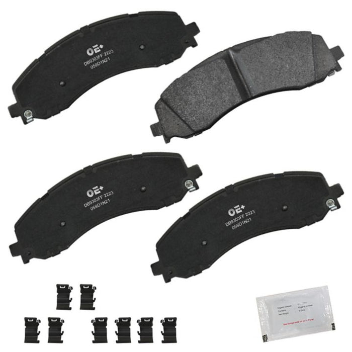 Four MMS2223 ProSeries OE+ Black Brake Pads, with additional small components and a packet of grease for installation.