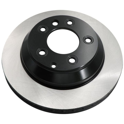 A shiny, metallic C26340 ProSeries OE+ Brake Rotor with a black central hub and several bolt holes, viewed from a slightly elevated angle.