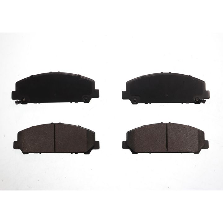 Four BFD1509CR ProSeries OE Brake Pads, black in color, arranged in two rows on a plain white background.