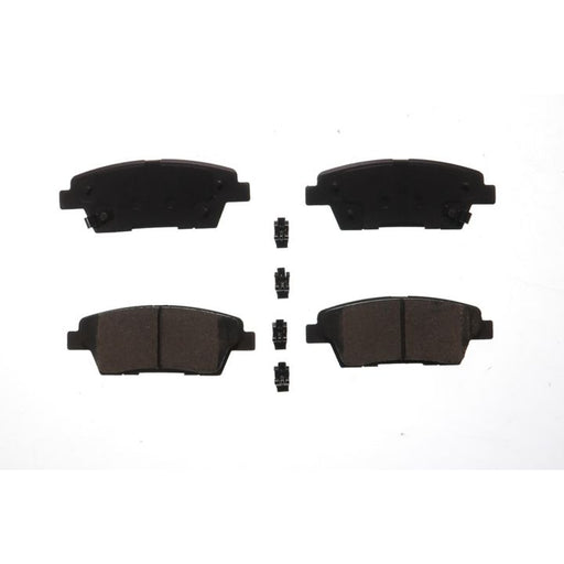 Four BFD1551CR ProSeries OE Brake Pads and mounting clips arranged on a white background.