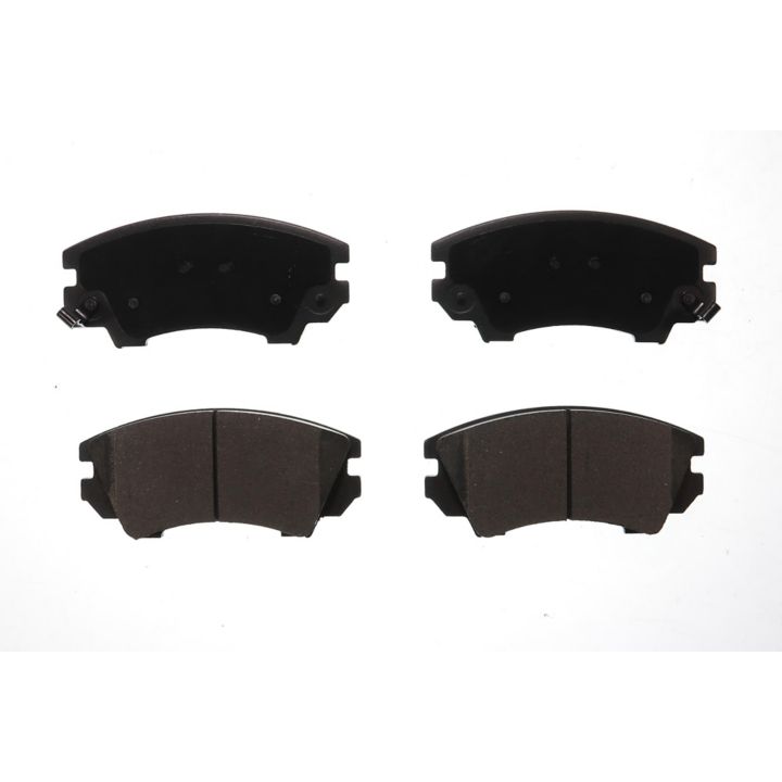 Four BFD1404CR ProSeries OE brake pads in black, arranged in a square on a white background.
