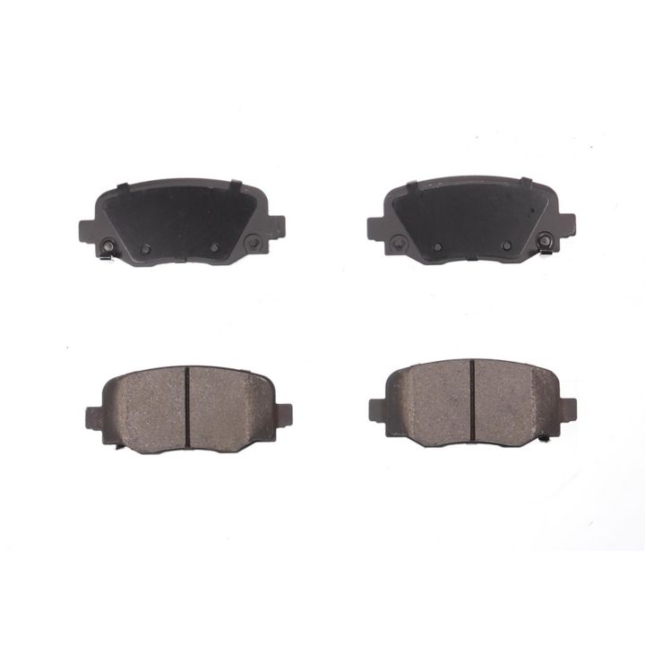 Four BFD1734CR ProSeries OE Brake Pads are arranged in two horizontal pairs, displaying their front and back sides against a white background.