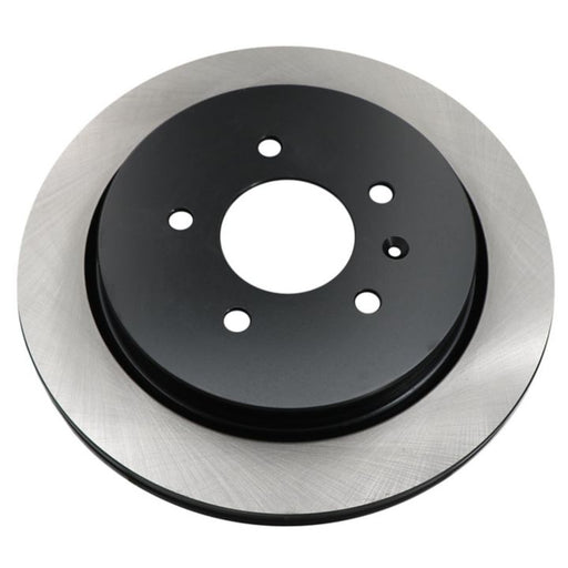 The C08562 ProSeries OE+ Brake Rotor is a car brake disc rotor with a black center and a silver edge, featuring multiple holes for mounting.