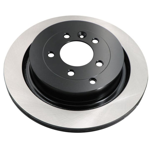 The C09064 ProSeries OE+ Brake Rotor is a black and silver circular car brake rotor with multiple holes in the center.