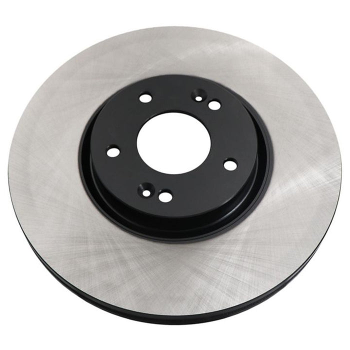 The C09651 ProSeries OE+ Brake Rotor features a shiny, metallic finish and five mounting holes in the center.