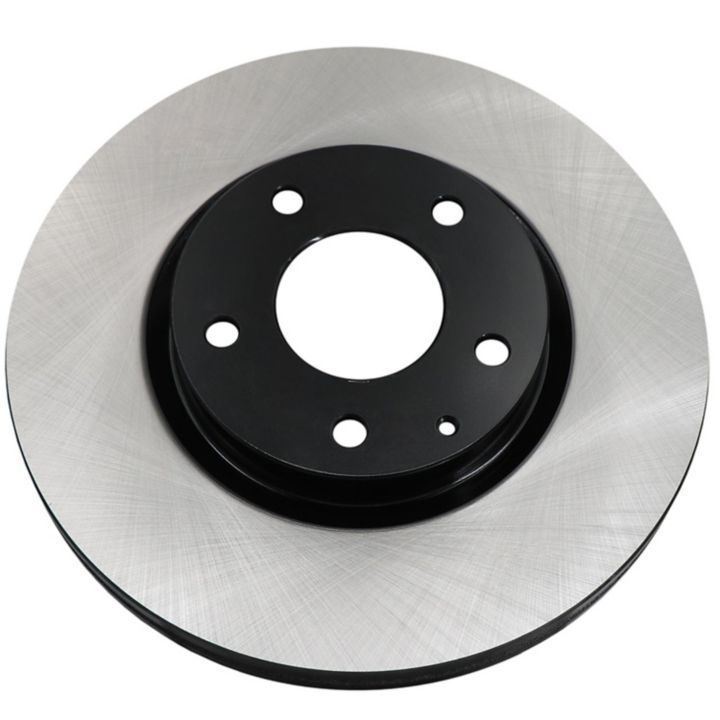 The C10084 ProSeries OE+ Brake Rotor features a single brake disc rotor with a smooth, shiny silver surface and a black central hub with several holes.